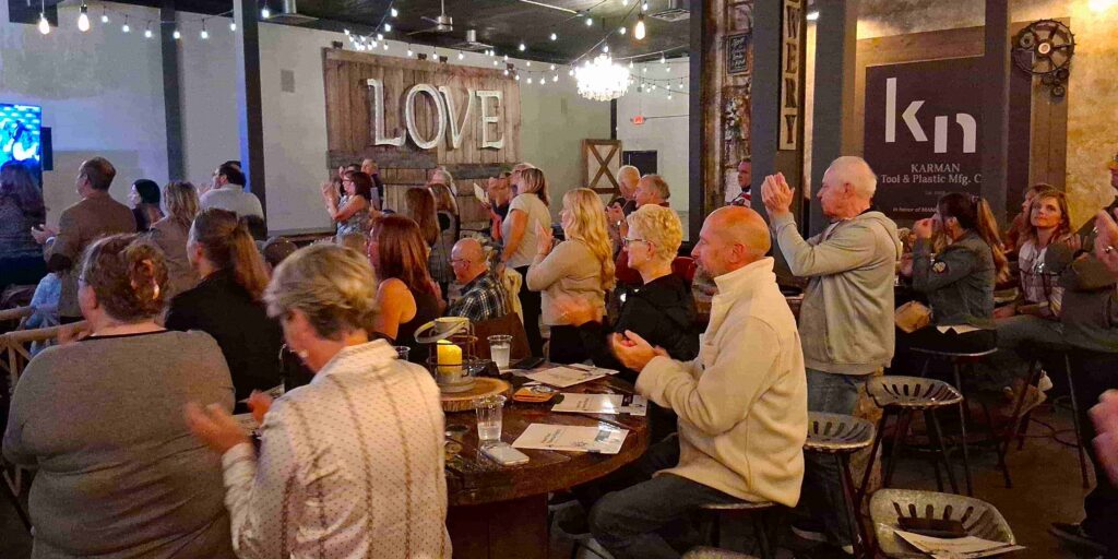 Crowd gives standing ovation to Tom Tiffany