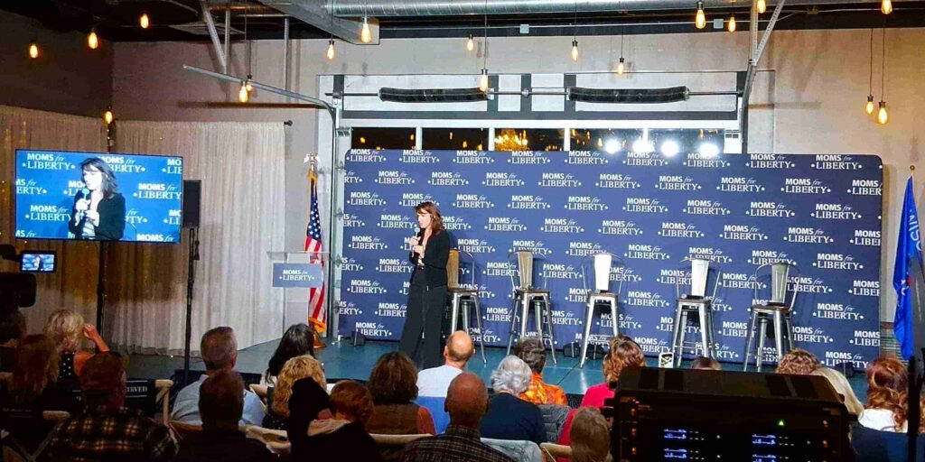 Moms for Liberty CEO Tina Descovich addresses the crowd